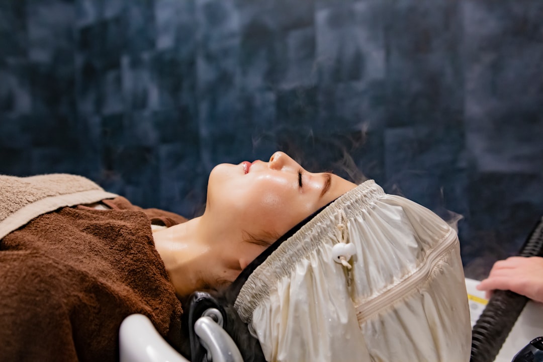 Professional scalp treatment at a spa with specialized tools