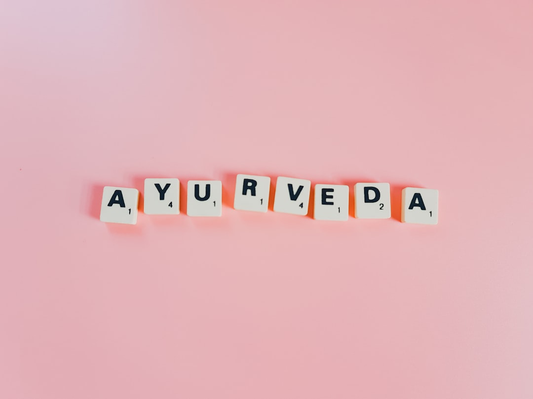 Ayurvedic wellness consultation with herbs and oils