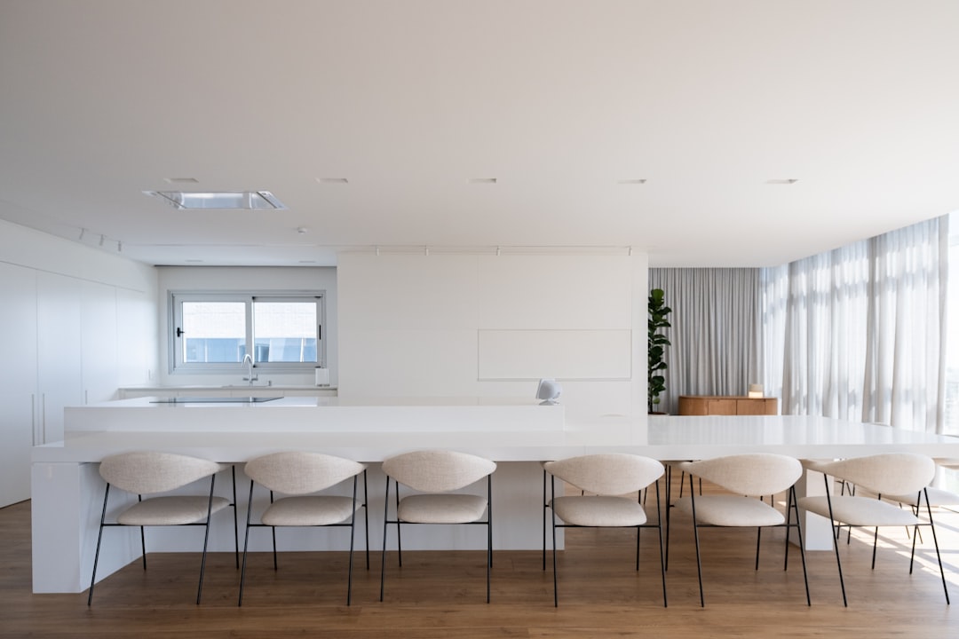 Modern kitchen island layout with open floor plan and seating
