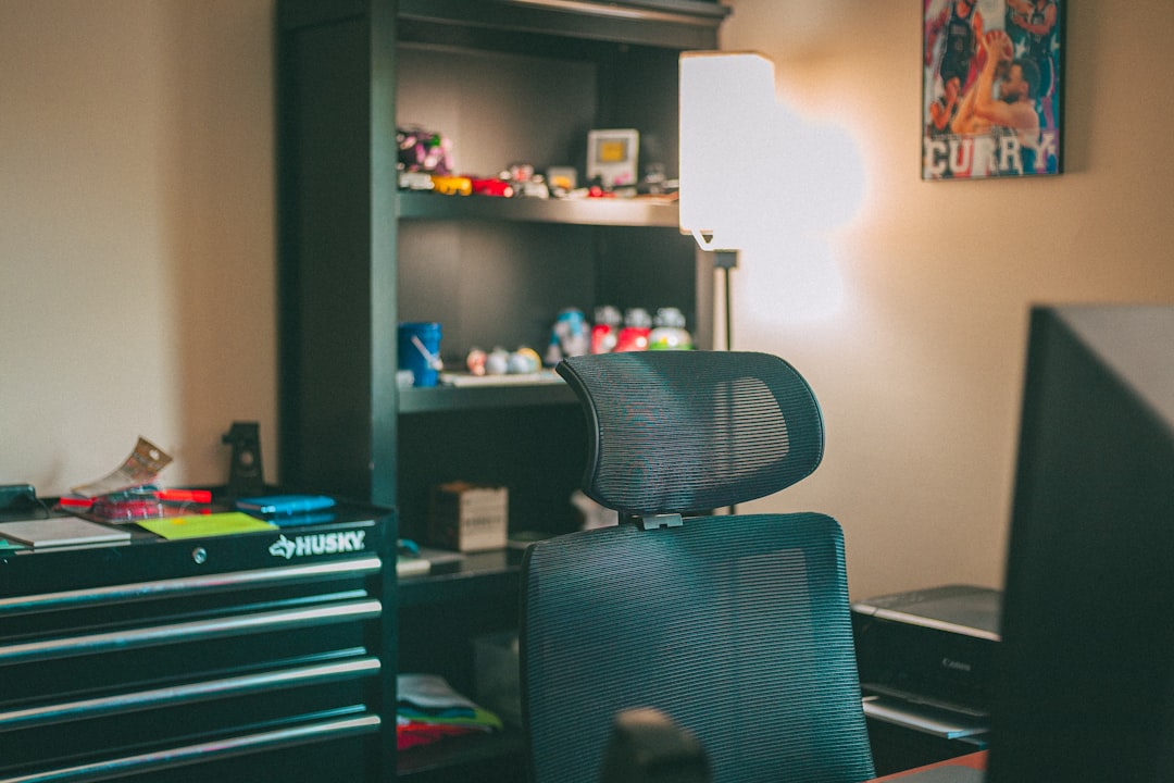 Organized home office with built-in desk and cabinets