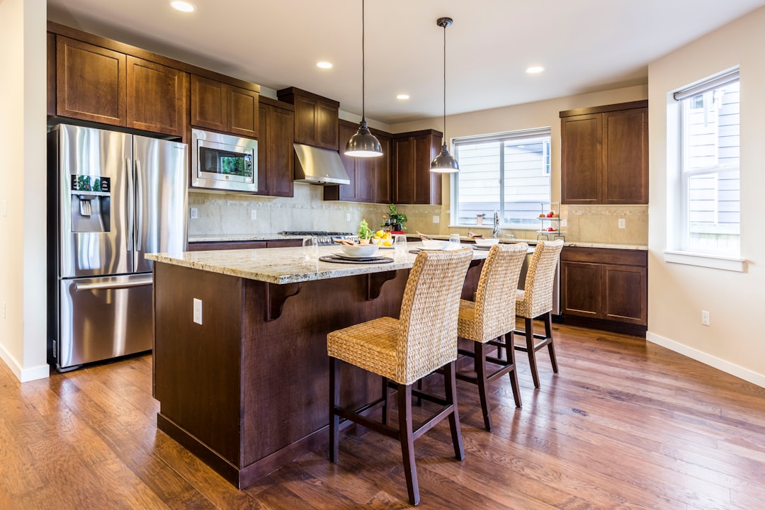 Brown stained wood kitchen cabinets showing natural grain
