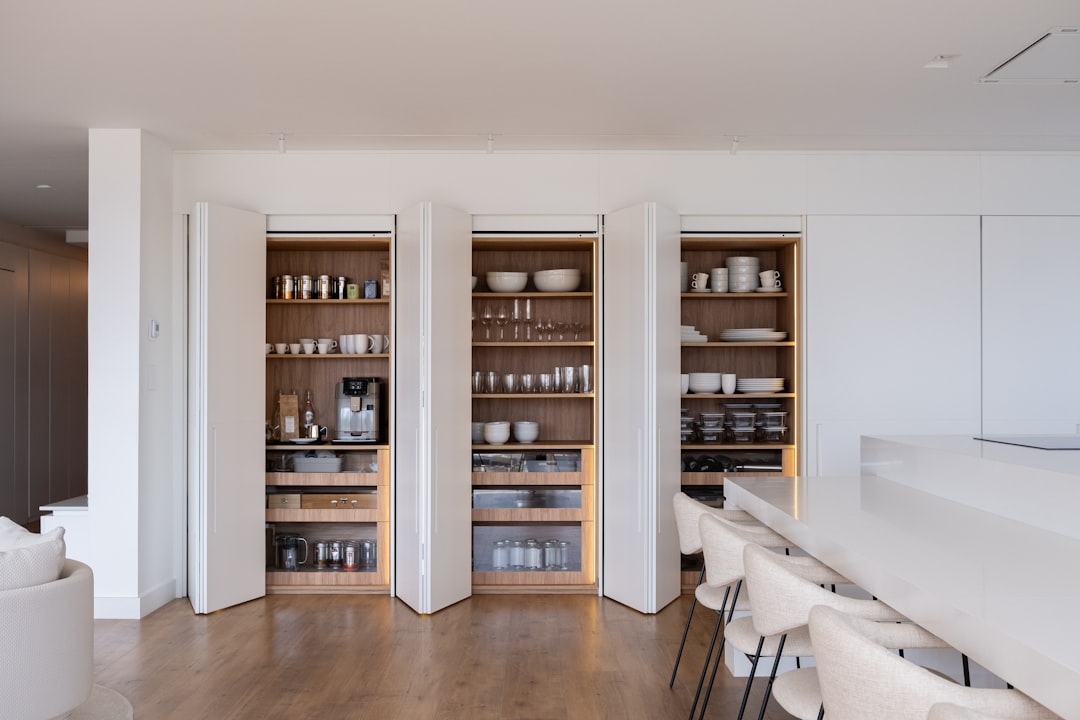 Modern pantry cabinet with pull-out shelves