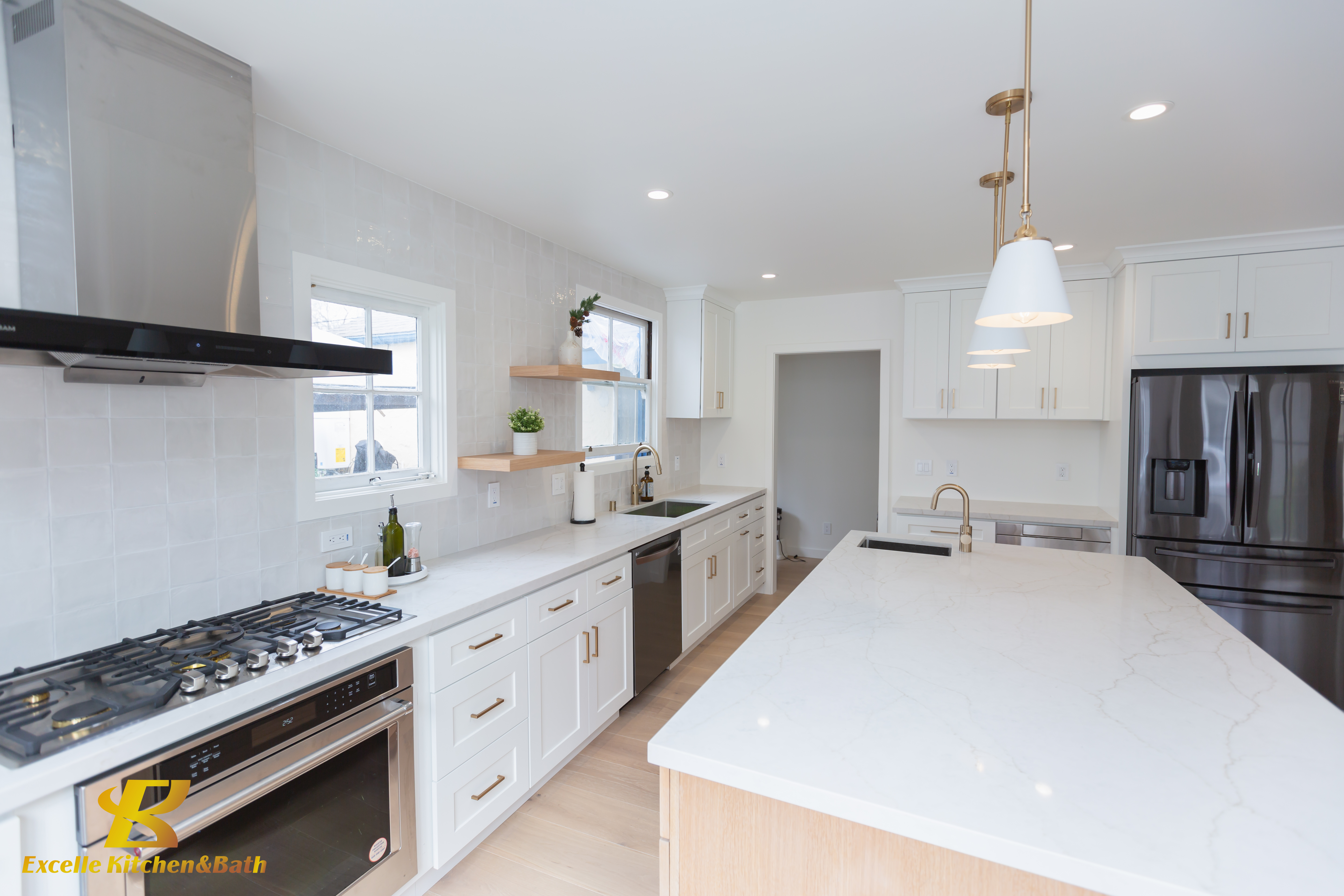 Semi-custom kitchen with full-height cabinetry and integrated storage